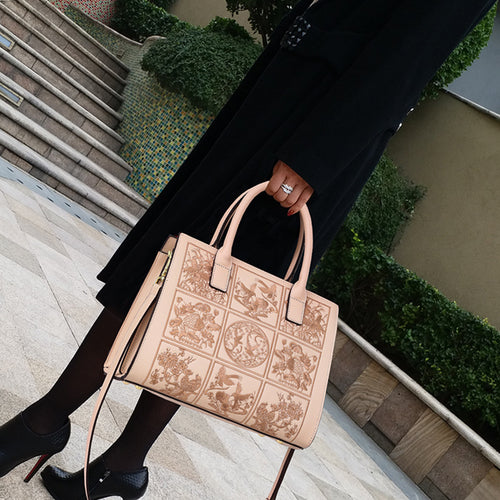 Broderad retro axelremsväska