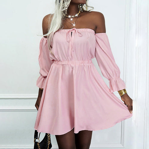 A model wearing a pink off-shoulder high-waist dress with long sleeves and a tie neckline.