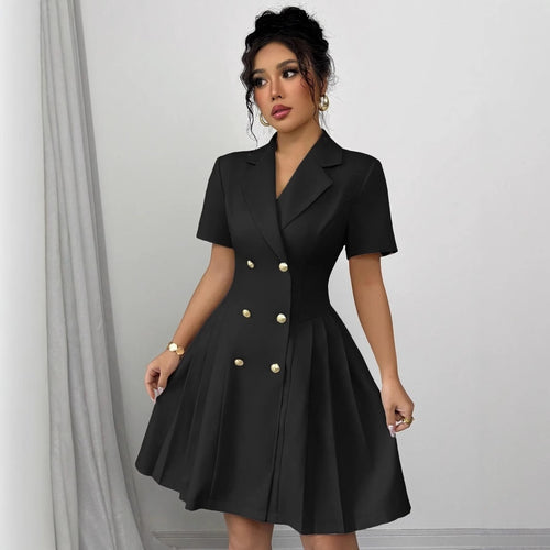 A woman wears a black double-breasted midi dress with gold buttons, short sleeves, and a pleated skirt.