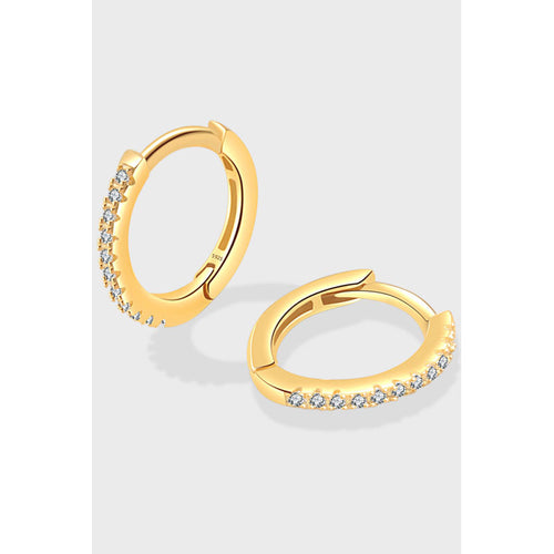 Two gold hoop earrings embellished with small clear stones, displayed on a light gray background.